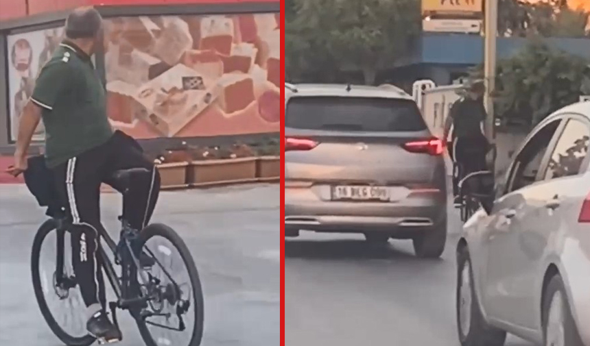 Görenler gözlerinden şüphe etti! Akan trafikte bisikletine ters binip dakikalarca yol gitti